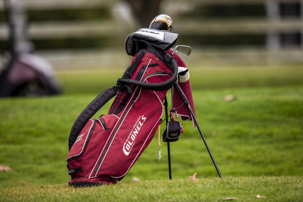 an EKU golf bag on a course