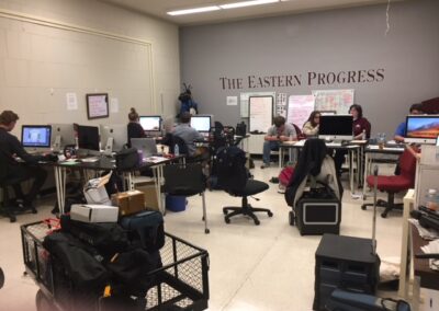 students work on computers for The Eastern Progress