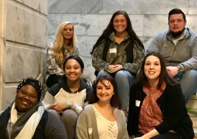 students pose at the Kentucky State Capitol building