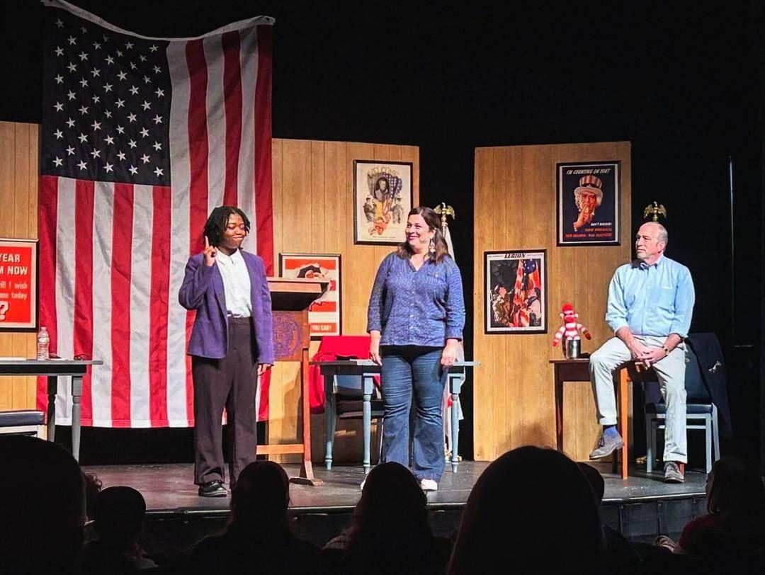 Actors Patrick Lee Lucas, Vanessa Becker Weig, and Cricket Brown performing on stage