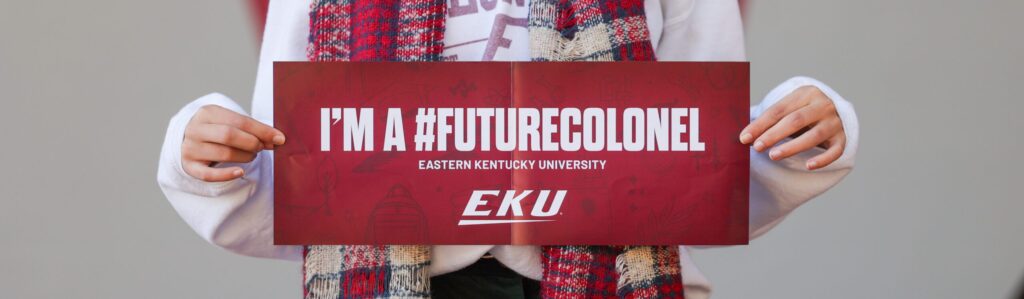hands holding a banner that says I'm a future Colonel Eastern Kentucky University