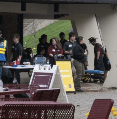 Students at an emergency simulation event