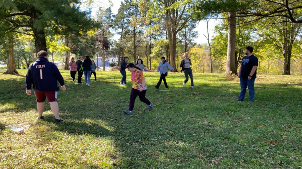 Students participate in an outdoor lab assignment at the Cardinal Lane Natural Area