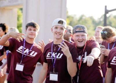 three students pose during the Big E Welcome Walk