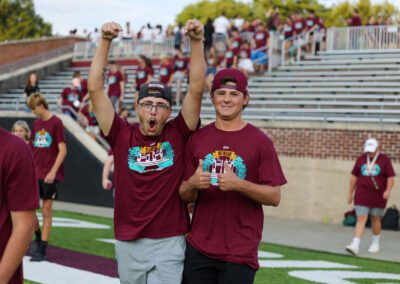 two students celebrate during Big E Welcome