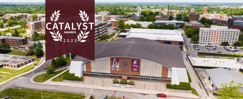 An aerial view of EKU's campus with the Alumni coliseum in the foreground