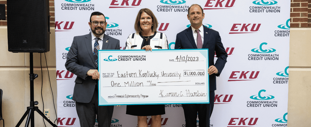 Commonwealth Credit Union presents check to EKU President David McFaddin