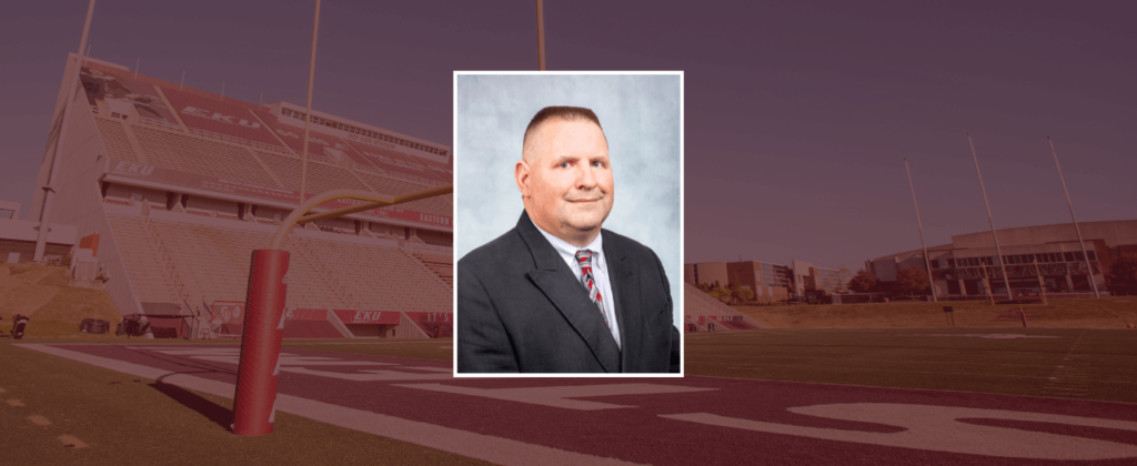 EKU faculty member, Erick Fuchs, smiles in a professional headshot photo