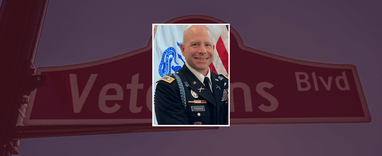 EKU's Office of Military and Veterans Affairs Director, Vincent A. Thomas smiles in his decorated uniform.