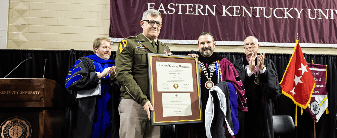 General Rainey receiving an honorary degree at graduation from EKU President David McFaddin