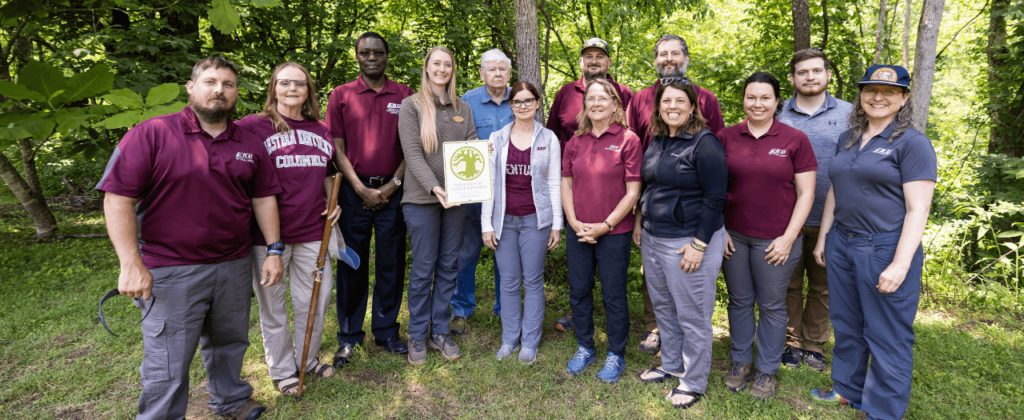 EKU staff in a forested area at Lilley Cornett Woods Appalachian Ecological Research Station