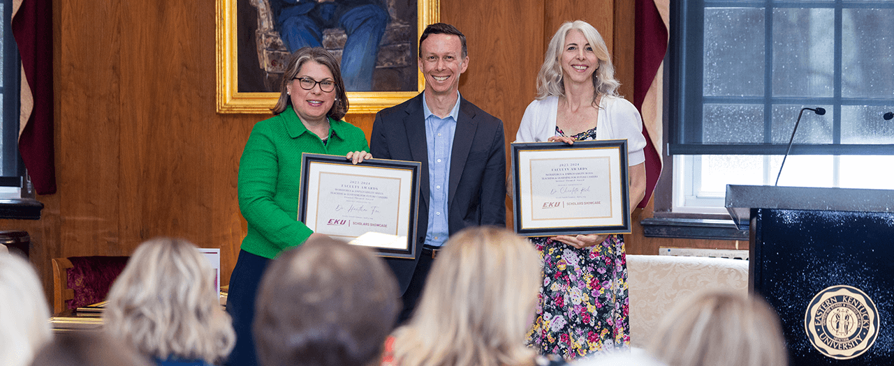 2023-2024 Faculty Award winners, Dr. Heather Fox, Dr. Rusty Carpenter, and Dr. Charlotte Rich at the ceremony in Keen Johnson.