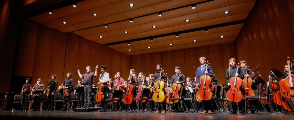 The orchestra stands at the EKU Center for the Arts Foster Grand Finale.