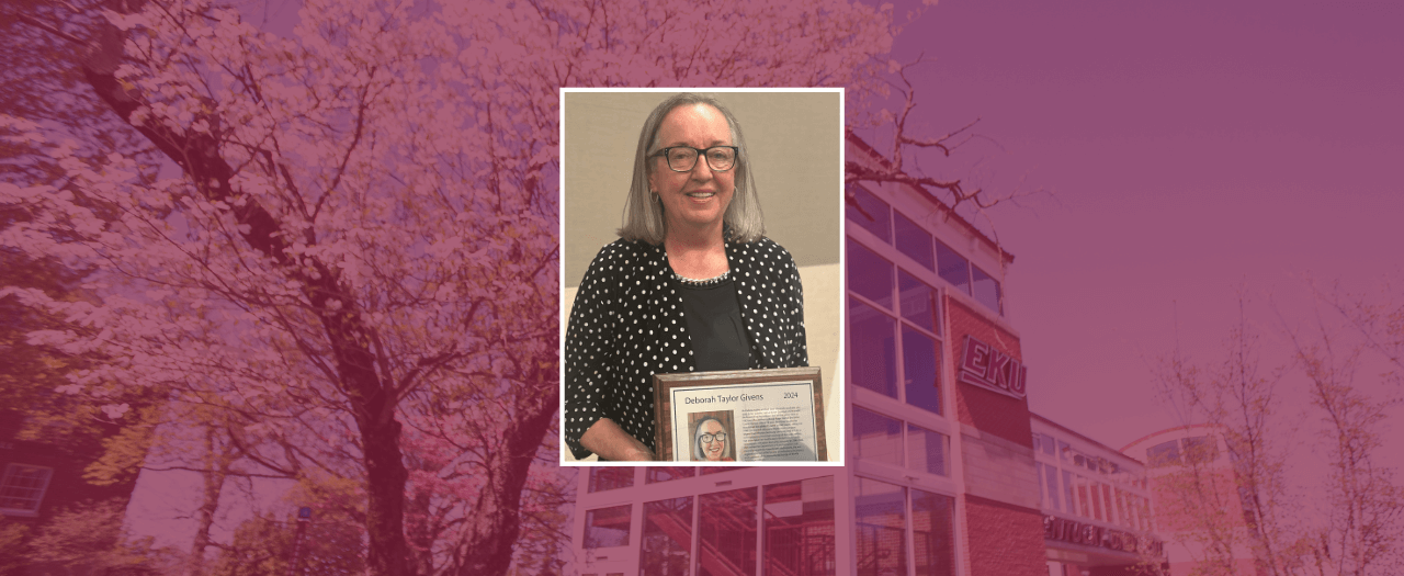 Emeritus Professor and Communication Department Chair Dr. Deborah Taylor Givens smiles and holds her award