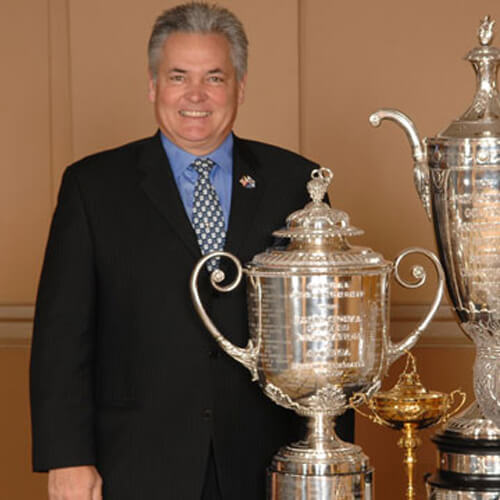 Professional photo of Jack Barber with PGA trophies