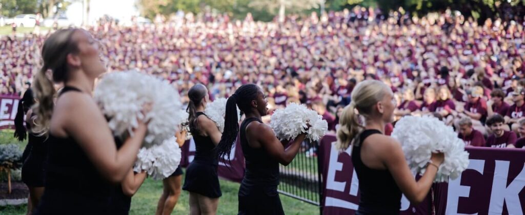 EKU cheerleaders rally the crowd of incoming freshman in the ravine at Big E Welcome.