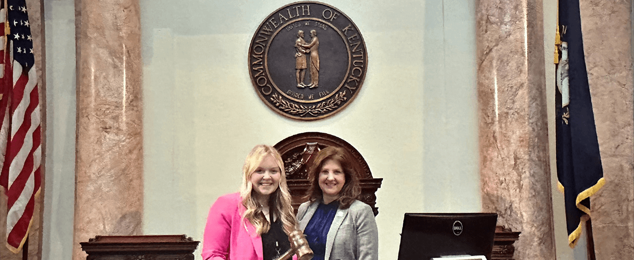 EKU Carly Frost and Kentucky State Representative Deanna Frazier in the House of Representatives at the capitol.