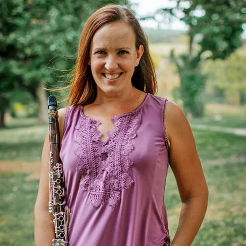 Photo of Adria Sutherland and her clarinet