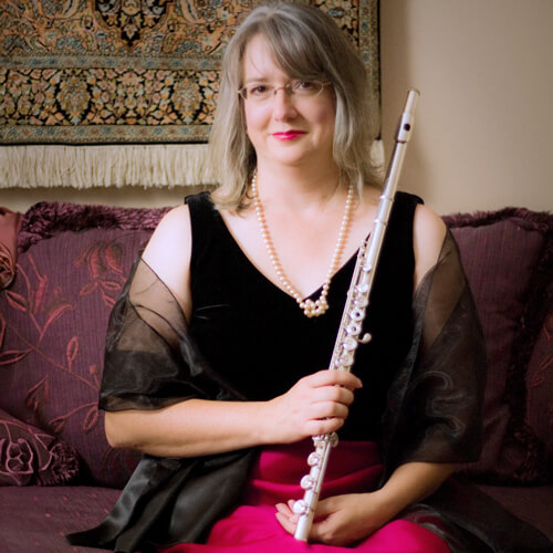 Professional photo of Kristen Kean with her flute